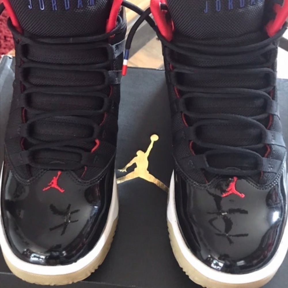 Max Aura Jordan Black and Red Sneakers with Glossy Finish